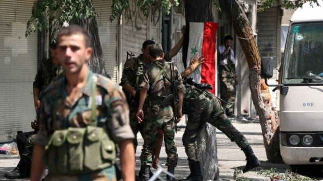 Σφοδρές μάχες στη Συρία ανάμεσα στον στρατό και τους τζιχαντιστές